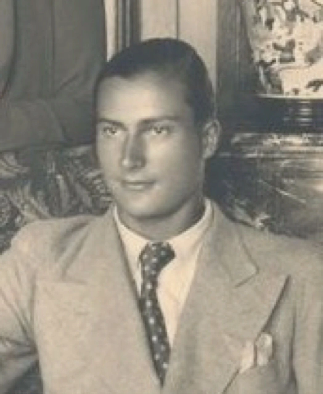 Portrait photo of a young man in a suit, likely Charles, Prince Napoléon.