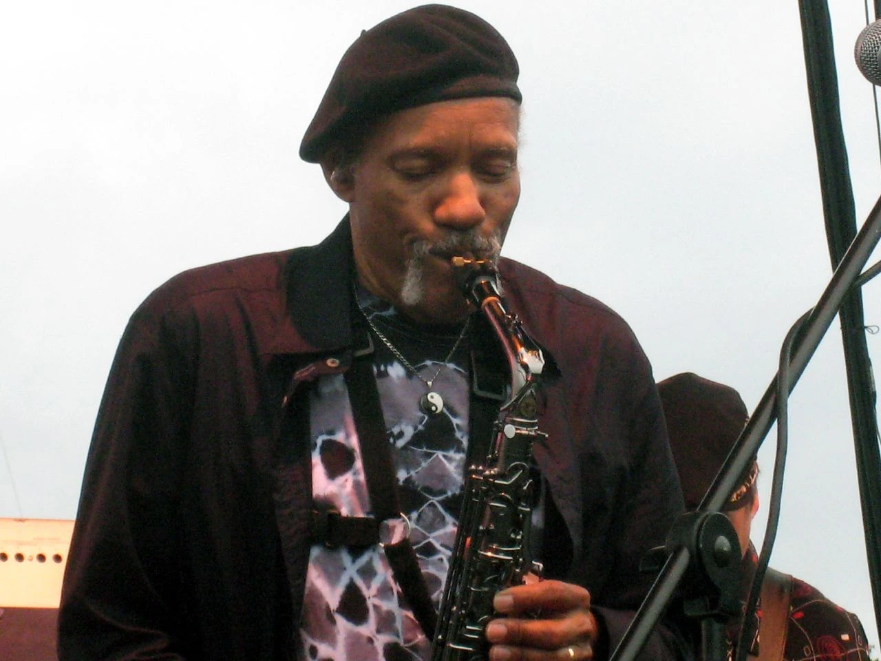 Charles Neville playing saxophone on stage
